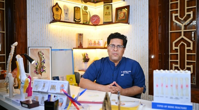 Dr. Sandeep Lenka consulting a patient